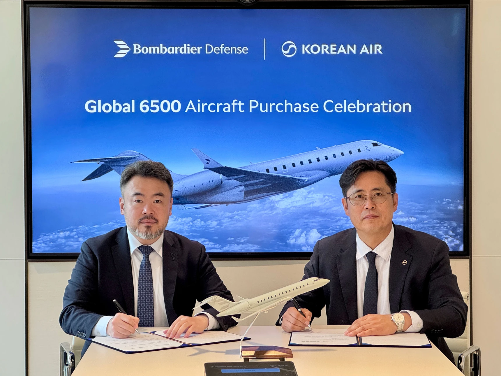 HyeonCheol Cho, Vice President, Defense Business, Korean Air (right), with Hoon Seok Jang, Sales Director, Bombardier Defense.